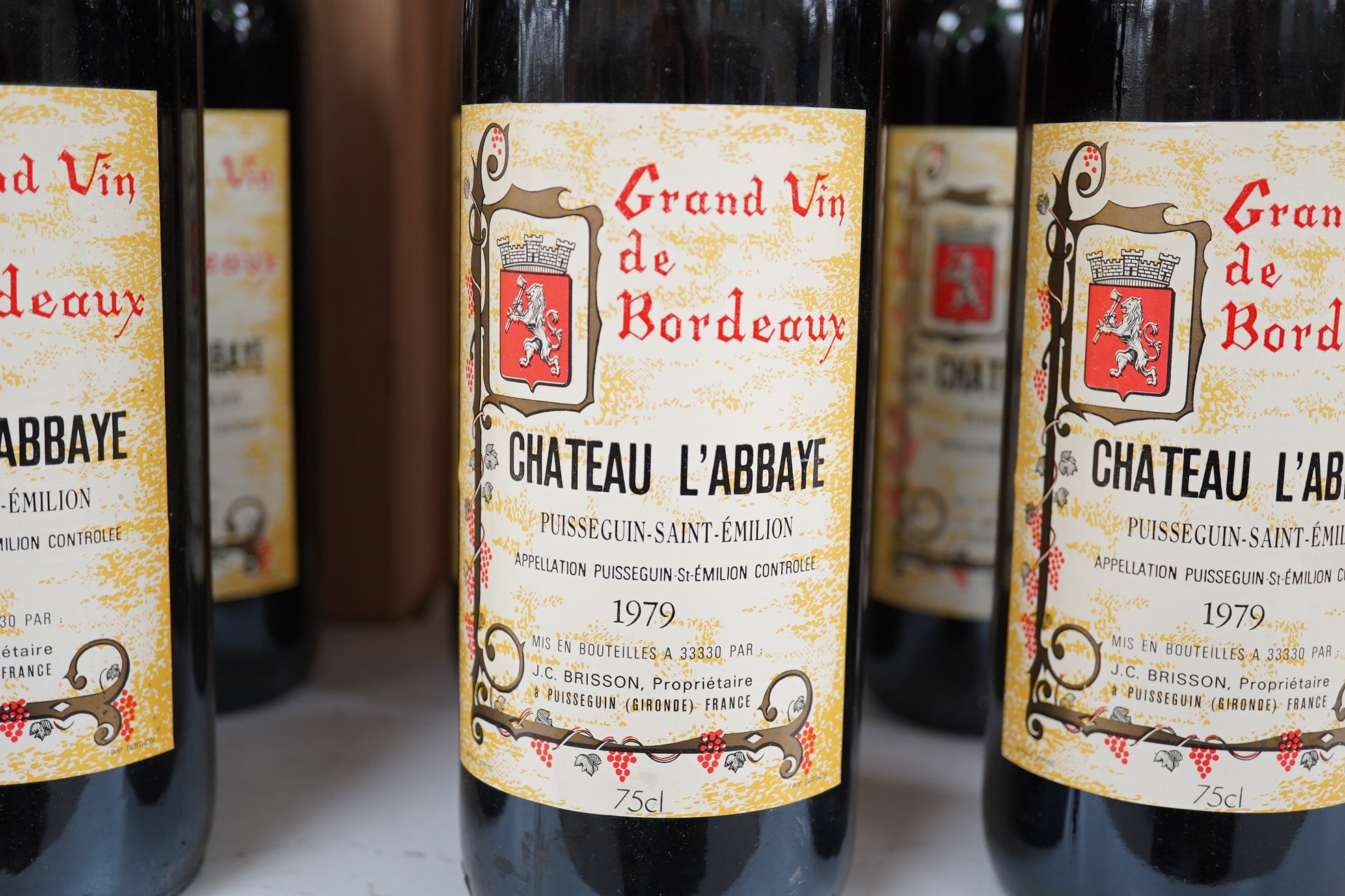 Nine bottles of Chateau L’Abbaye Puisseguin-Saint-Emilion 1979 red wine. Condition - fair to good